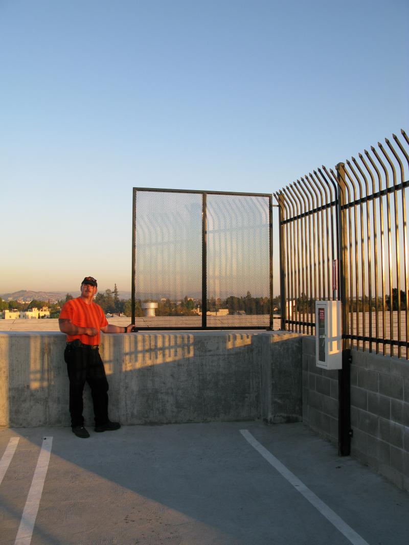 Municipal Safety Barrier:  A simple, sturdy and effective barrier atop a six-sto